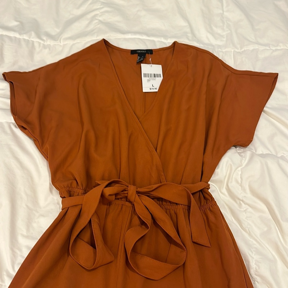 Brand new Forever 21 jumpsuit in rust